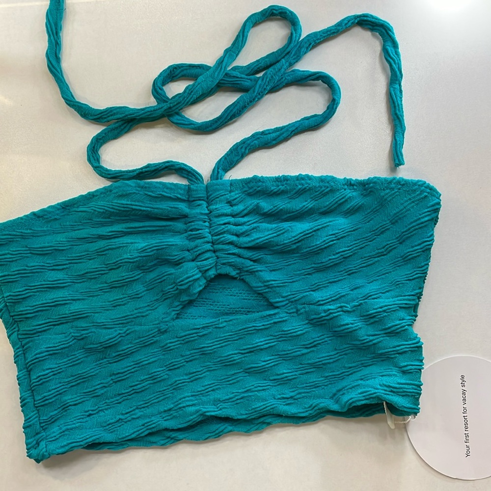 Cute and adorable teal halter top.